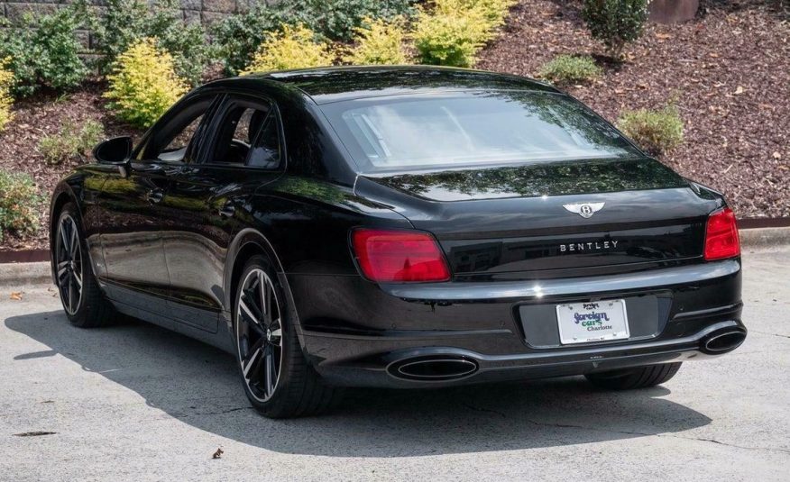 2020 Bentley Flying Spur W12  Item specifics Condition:	Used	Year:	2020 VIN (Vehicle Identification Number):	SCBBB6ZG4LC081919	Mileage:	1582 Vehicle Title:	Clean	Make:	Bentley Sub Model:	W12	Trim:	W12 Drive Type:	AWD	Engine:	Twin Turbo Premium Unleaded W-12 6.0 L/363 Fuel Type:	Gasoline	Style ID:	0 Body Type:	4dr Car	Options:	— Power Options:	Electric Power-Assist Speed-Sensing Steering	Exterior Color:	BELUGA Interior Color:	—	Transmission:	Automatic Warranty:	Unspecified	For Sale By:	Dealer Model:	Flying Spur    Vehicle Equipment Exterior Features Auto On/Off Projector Beam Led Low/High Beam Daytime Running Auto-Leveling Auto High-Beam Headlamps Body-Colored Door Handles Body-Colored Front Bumper w/Chrome Rub Strip/Fascia Accent and Black Bumper Insert Body-Colored Power Heated Auto Dimming Side Mirrors w/Power Folding and Turn Signal Indicator Body-Colored Rear Bumper w/Chrome Bumper Insert Chrome Bodyside Insert Chrome Grille Chrome Side Windows Trim Clearcoat Paint Door Auto-Latch Fixed Rear Window w/Defroster Galvanized Steel/Aluminum/Composite Panels Laminated Glass LED Brakelights Light Tinted Glass Power Open And Close Trunk Rear Cargo Access Rear Fog Lamps Spare Tire Mobility Kit Speed Sensitive Rain Detecting Variable Intermittent Wipers Wheels w/Locks Interior Features 2 12V DC Power Outlets 2 Seatback Storage Pockets Air Filtration Cargo Features -inc: Spare Tire Mobility Kit Cargo Space Lights Carpet Floor Trim and Carpet Trunk Lid/Rear Cargo Door Trim Compass Day-Night Auto-Dimming Rearview Mirror Delayed Accessory Power Digital/Analog Appearance Driver And Passenger Visor Vanity Mirrors w/Driver And Passenger Illumination and Rear Visor Mirror Driver Foot Rest Driver Seat Engine Immobilizer Fade-To-Off Interior Lighting Front And Rear Map Lights Front Cupholder Full Alcantara Simulated Suede Headliner Full Carpet Floor Covering Full Floor Console w/Covered Storage, Mini Overhead Console and 2 12V DC Power Outlets HVAC -inc: Underseat Ducts, Headliner/Pillar Ducts and Console Ducts Illuminated Locking Glove Box Interior Concealed Storage, Driver / Passenger And Rear Door Bins Leather Door Trim Insert Leather/Chrome Gear Shifter Material Outside Temp Gauge Perimeter Alarm Power Anti-Whiplash Adjustable Front Head Restraints and Power Anti-Whiplash Adjustable Rear Head Restraints Power Tilt/Telescoping Steering Column Rear Cupholder Redundant Digital Speedometer Remote Releases -Inc: Proximity Cargo Access and Power Fuel Smart Device Integration Systems Monitor Trunk/Hatch Auto-Latch Voice Activated Cell Phone Mechanical Features 23.8 Gal. Fuel Tank 3.31 Axle Ratio 4-Corner Auto-Leveling Suspension 4-Wheel Disc Brakes w/4-Wheel ABS, Front And Rear Vented Discs, Brake Assist, Hill Hold Control and Electric Parking Brake Automatic Full-Time All-Wheel Automatic w/Driver Control Height Adjustable Automatic w/Driver Control Ride Control Touring Adaptive Suspension Battery w/Run Down Protection Bentley Dynamic Ride Front And Rear Active Anti-Roll Bars Dual Stainless Steel Exhaust w/Polished Tailpipe Finisher Electric Power-Assist Speed-Sensing Steering Engine: 6.0L Twin Turbo-Charged W12 Safety Features Airbag Occupancy Sensor Back-Up Camera Curtain 1st And 2nd Row Airbags Dual Stage Driver And Passenger Front Airbags Front And Rear Parking Sensors Front Camera Left Side Camera Outboard Front Lap And Shoulder Safety Belts -inc: Rear Center 3 Point, Height Adjusters and Pretensioners Right Side Camera Side Impact Beams Tire Specific Low Tire Pressure Warning Entertainment Features 2 LCD Monitors In The Front and 1 LCD Row Monitor In The Rear 650w Regular Amplifier Audio Theft Deterrent Bluetooth Wireless Phone Connectivity Concealed Diversity Antenna Streaming Audio