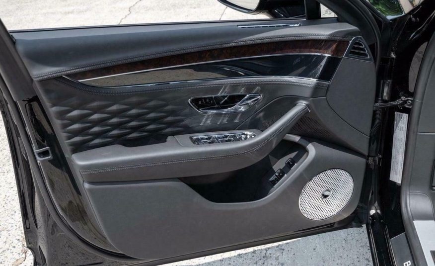 2020 Bentley Flying Spur W12  Item specifics Condition:	Used	Year:	2020 VIN (Vehicle Identification Number):	SCBBB6ZG4LC081919	Mileage:	1582 Vehicle Title:	Clean	Make:	Bentley Sub Model:	W12	Trim:	W12 Drive Type:	AWD	Engine:	Twin Turbo Premium Unleaded W-12 6.0 L/363 Fuel Type:	Gasoline	Style ID:	0 Body Type:	4dr Car	Options:	— Power Options:	Electric Power-Assist Speed-Sensing Steering	Exterior Color:	BELUGA Interior Color:	—	Transmission:	Automatic Warranty:	Unspecified	For Sale By:	Dealer Model:	Flying Spur    Vehicle Equipment Exterior Features Auto On/Off Projector Beam Led Low/High Beam Daytime Running Auto-Leveling Auto High-Beam Headlamps Body-Colored Door Handles Body-Colored Front Bumper w/Chrome Rub Strip/Fascia Accent and Black Bumper Insert Body-Colored Power Heated Auto Dimming Side Mirrors w/Power Folding and Turn Signal Indicator Body-Colored Rear Bumper w/Chrome Bumper Insert Chrome Bodyside Insert Chrome Grille Chrome Side Windows Trim Clearcoat Paint Door Auto-Latch Fixed Rear Window w/Defroster Galvanized Steel/Aluminum/Composite Panels Laminated Glass LED Brakelights Light Tinted Glass Power Open And Close Trunk Rear Cargo Access Rear Fog Lamps Spare Tire Mobility Kit Speed Sensitive Rain Detecting Variable Intermittent Wipers Wheels w/Locks Interior Features 2 12V DC Power Outlets 2 Seatback Storage Pockets Air Filtration Cargo Features -inc: Spare Tire Mobility Kit Cargo Space Lights Carpet Floor Trim and Carpet Trunk Lid/Rear Cargo Door Trim Compass Day-Night Auto-Dimming Rearview Mirror Delayed Accessory Power Digital/Analog Appearance Driver And Passenger Visor Vanity Mirrors w/Driver And Passenger Illumination and Rear Visor Mirror Driver Foot Rest Driver Seat Engine Immobilizer Fade-To-Off Interior Lighting Front And Rear Map Lights Front Cupholder Full Alcantara Simulated Suede Headliner Full Carpet Floor Covering Full Floor Console w/Covered Storage, Mini Overhead Console and 2 12V DC Power Outlets HVAC -inc: Underseat Ducts, Headliner/Pillar Ducts and Console Ducts Illuminated Locking Glove Box Interior Concealed Storage, Driver / Passenger And Rear Door Bins Leather Door Trim Insert Leather/Chrome Gear Shifter Material Outside Temp Gauge Perimeter Alarm Power Anti-Whiplash Adjustable Front Head Restraints and Power Anti-Whiplash Adjustable Rear Head Restraints Power Tilt/Telescoping Steering Column Rear Cupholder Redundant Digital Speedometer Remote Releases -Inc: Proximity Cargo Access and Power Fuel Smart Device Integration Systems Monitor Trunk/Hatch Auto-Latch Voice Activated Cell Phone Mechanical Features 23.8 Gal. Fuel Tank 3.31 Axle Ratio 4-Corner Auto-Leveling Suspension 4-Wheel Disc Brakes w/4-Wheel ABS, Front And Rear Vented Discs, Brake Assist, Hill Hold Control and Electric Parking Brake Automatic Full-Time All-Wheel Automatic w/Driver Control Height Adjustable Automatic w/Driver Control Ride Control Touring Adaptive Suspension Battery w/Run Down Protection Bentley Dynamic Ride Front And Rear Active Anti-Roll Bars Dual Stainless Steel Exhaust w/Polished Tailpipe Finisher Electric Power-Assist Speed-Sensing Steering Engine: 6.0L Twin Turbo-Charged W12 Safety Features Airbag Occupancy Sensor Back-Up Camera Curtain 1st And 2nd Row Airbags Dual Stage Driver And Passenger Front Airbags Front And Rear Parking Sensors Front Camera Left Side Camera Outboard Front Lap And Shoulder Safety Belts -inc: Rear Center 3 Point, Height Adjusters and Pretensioners Right Side Camera Side Impact Beams Tire Specific Low Tire Pressure Warning Entertainment Features 2 LCD Monitors In The Front and 1 LCD Row Monitor In The Rear 650w Regular Amplifier Audio Theft Deterrent Bluetooth Wireless Phone Connectivity Concealed Diversity Antenna Streaming Audio