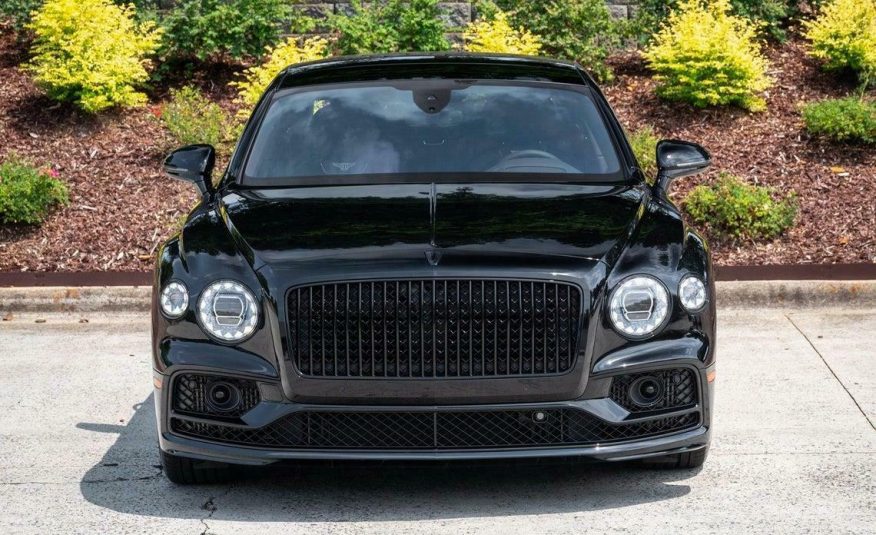 2020 Bentley Flying Spur W12  Item specifics Condition:	Used	Year:	2020 VIN (Vehicle Identification Number):	SCBBB6ZG4LC081919	Mileage:	1582 Vehicle Title:	Clean	Make:	Bentley Sub Model:	W12	Trim:	W12 Drive Type:	AWD	Engine:	Twin Turbo Premium Unleaded W-12 6.0 L/363 Fuel Type:	Gasoline	Style ID:	0 Body Type:	4dr Car	Options:	— Power Options:	Electric Power-Assist Speed-Sensing Steering	Exterior Color:	BELUGA Interior Color:	—	Transmission:	Automatic Warranty:	Unspecified	For Sale By:	Dealer Model:	Flying Spur    Vehicle Equipment Exterior Features Auto On/Off Projector Beam Led Low/High Beam Daytime Running Auto-Leveling Auto High-Beam Headlamps Body-Colored Door Handles Body-Colored Front Bumper w/Chrome Rub Strip/Fascia Accent and Black Bumper Insert Body-Colored Power Heated Auto Dimming Side Mirrors w/Power Folding and Turn Signal Indicator Body-Colored Rear Bumper w/Chrome Bumper Insert Chrome Bodyside Insert Chrome Grille Chrome Side Windows Trim Clearcoat Paint Door Auto-Latch Fixed Rear Window w/Defroster Galvanized Steel/Aluminum/Composite Panels Laminated Glass LED Brakelights Light Tinted Glass Power Open And Close Trunk Rear Cargo Access Rear Fog Lamps Spare Tire Mobility Kit Speed Sensitive Rain Detecting Variable Intermittent Wipers Wheels w/Locks Interior Features 2 12V DC Power Outlets 2 Seatback Storage Pockets Air Filtration Cargo Features -inc: Spare Tire Mobility Kit Cargo Space Lights Carpet Floor Trim and Carpet Trunk Lid/Rear Cargo Door Trim Compass Day-Night Auto-Dimming Rearview Mirror Delayed Accessory Power Digital/Analog Appearance Driver And Passenger Visor Vanity Mirrors w/Driver And Passenger Illumination and Rear Visor Mirror Driver Foot Rest Driver Seat Engine Immobilizer Fade-To-Off Interior Lighting Front And Rear Map Lights Front Cupholder Full Alcantara Simulated Suede Headliner Full Carpet Floor Covering Full Floor Console w/Covered Storage, Mini Overhead Console and 2 12V DC Power Outlets HVAC -inc: Underseat Ducts, Headliner/Pillar Ducts and Console Ducts Illuminated Locking Glove Box Interior Concealed Storage, Driver / Passenger And Rear Door Bins Leather Door Trim Insert Leather/Chrome Gear Shifter Material Outside Temp Gauge Perimeter Alarm Power Anti-Whiplash Adjustable Front Head Restraints and Power Anti-Whiplash Adjustable Rear Head Restraints Power Tilt/Telescoping Steering Column Rear Cupholder Redundant Digital Speedometer Remote Releases -Inc: Proximity Cargo Access and Power Fuel Smart Device Integration Systems Monitor Trunk/Hatch Auto-Latch Voice Activated Cell Phone Mechanical Features 23.8 Gal. Fuel Tank 3.31 Axle Ratio 4-Corner Auto-Leveling Suspension 4-Wheel Disc Brakes w/4-Wheel ABS, Front And Rear Vented Discs, Brake Assist, Hill Hold Control and Electric Parking Brake Automatic Full-Time All-Wheel Automatic w/Driver Control Height Adjustable Automatic w/Driver Control Ride Control Touring Adaptive Suspension Battery w/Run Down Protection Bentley Dynamic Ride Front And Rear Active Anti-Roll Bars Dual Stainless Steel Exhaust w/Polished Tailpipe Finisher Electric Power-Assist Speed-Sensing Steering Engine: 6.0L Twin Turbo-Charged W12 Safety Features Airbag Occupancy Sensor Back-Up Camera Curtain 1st And 2nd Row Airbags Dual Stage Driver And Passenger Front Airbags Front And Rear Parking Sensors Front Camera Left Side Camera Outboard Front Lap And Shoulder Safety Belts -inc: Rear Center 3 Point, Height Adjusters and Pretensioners Right Side Camera Side Impact Beams Tire Specific Low Tire Pressure Warning Entertainment Features 2 LCD Monitors In The Front and 1 LCD Row Monitor In The Rear 650w Regular Amplifier Audio Theft Deterrent Bluetooth Wireless Phone Connectivity Concealed Diversity Antenna Streaming Audio
