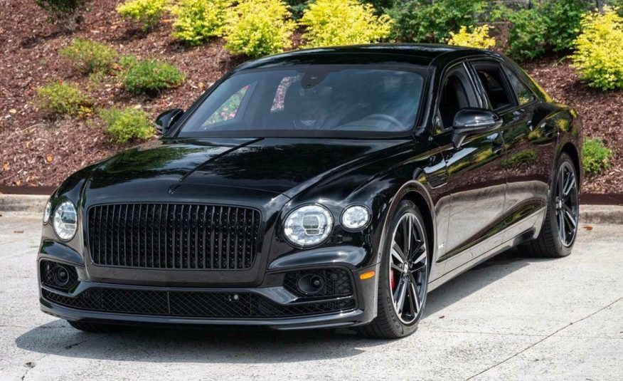 2020 Bentley Flying Spur W12  Item specifics Condition:	Used	Year:	2020 VIN (Vehicle Identification Number):	SCBBB6ZG4LC081919	Mileage:	1582 Vehicle Title:	Clean	Make:	Bentley Sub Model:	W12	Trim:	W12 Drive Type:	AWD	Engine:	Twin Turbo Premium Unleaded W-12 6.0 L/363 Fuel Type:	Gasoline	Style ID:	0 Body Type:	4dr Car	Options:	— Power Options:	Electric Power-Assist Speed-Sensing Steering	Exterior Color:	BELUGA Interior Color:	—	Transmission:	Automatic Warranty:	Unspecified	For Sale By:	Dealer Model:	Flying Spur    Vehicle Equipment Exterior Features Auto On/Off Projector Beam Led Low/High Beam Daytime Running Auto-Leveling Auto High-Beam Headlamps Body-Colored Door Handles Body-Colored Front Bumper w/Chrome Rub Strip/Fascia Accent and Black Bumper Insert Body-Colored Power Heated Auto Dimming Side Mirrors w/Power Folding and Turn Signal Indicator Body-Colored Rear Bumper w/Chrome Bumper Insert Chrome Bodyside Insert Chrome Grille Chrome Side Windows Trim Clearcoat Paint Door Auto-Latch Fixed Rear Window w/Defroster Galvanized Steel/Aluminum/Composite Panels Laminated Glass LED Brakelights Light Tinted Glass Power Open And Close Trunk Rear Cargo Access Rear Fog Lamps Spare Tire Mobility Kit Speed Sensitive Rain Detecting Variable Intermittent Wipers Wheels w/Locks Interior Features 2 12V DC Power Outlets 2 Seatback Storage Pockets Air Filtration Cargo Features -inc: Spare Tire Mobility Kit Cargo Space Lights Carpet Floor Trim and Carpet Trunk Lid/Rear Cargo Door Trim Compass Day-Night Auto-Dimming Rearview Mirror Delayed Accessory Power Digital/Analog Appearance Driver And Passenger Visor Vanity Mirrors w/Driver And Passenger Illumination and Rear Visor Mirror Driver Foot Rest Driver Seat Engine Immobilizer Fade-To-Off Interior Lighting Front And Rear Map Lights Front Cupholder Full Alcantara Simulated Suede Headliner Full Carpet Floor Covering Full Floor Console w/Covered Storage, Mini Overhead Console and 2 12V DC Power Outlets HVAC -inc: Underseat Ducts, Headliner/Pillar Ducts and Console Ducts Illuminated Locking Glove Box Interior Concealed Storage, Driver / Passenger And Rear Door Bins Leather Door Trim Insert Leather/Chrome Gear Shifter Material Outside Temp Gauge Perimeter Alarm Power Anti-Whiplash Adjustable Front Head Restraints and Power Anti-Whiplash Adjustable Rear Head Restraints Power Tilt/Telescoping Steering Column Rear Cupholder Redundant Digital Speedometer Remote Releases -Inc: Proximity Cargo Access and Power Fuel Smart Device Integration Systems Monitor Trunk/Hatch Auto-Latch Voice Activated Cell Phone Mechanical Features 23.8 Gal. Fuel Tank 3.31 Axle Ratio 4-Corner Auto-Leveling Suspension 4-Wheel Disc Brakes w/4-Wheel ABS, Front And Rear Vented Discs, Brake Assist, Hill Hold Control and Electric Parking Brake Automatic Full-Time All-Wheel Automatic w/Driver Control Height Adjustable Automatic w/Driver Control Ride Control Touring Adaptive Suspension Battery w/Run Down Protection Bentley Dynamic Ride Front And Rear Active Anti-Roll Bars Dual Stainless Steel Exhaust w/Polished Tailpipe Finisher Electric Power-Assist Speed-Sensing Steering Engine: 6.0L Twin Turbo-Charged W12 Safety Features Airbag Occupancy Sensor Back-Up Camera Curtain 1st And 2nd Row Airbags Dual Stage Driver And Passenger Front Airbags Front And Rear Parking Sensors Front Camera Left Side Camera Outboard Front Lap And Shoulder Safety Belts -inc: Rear Center 3 Point, Height Adjusters and Pretensioners Right Side Camera Side Impact Beams Tire Specific Low Tire Pressure Warning Entertainment Features 2 LCD Monitors In The Front and 1 LCD Row Monitor In The Rear 650w Regular Amplifier Audio Theft Deterrent Bluetooth Wireless Phone Connectivity Concealed Diversity Antenna Streaming Audio